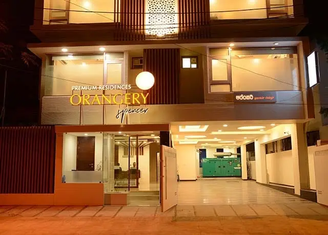 Front entrance of Orangery Premium Residences at night